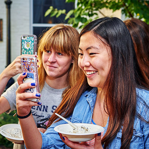 Scholars enjoying ice cream at Founders Day