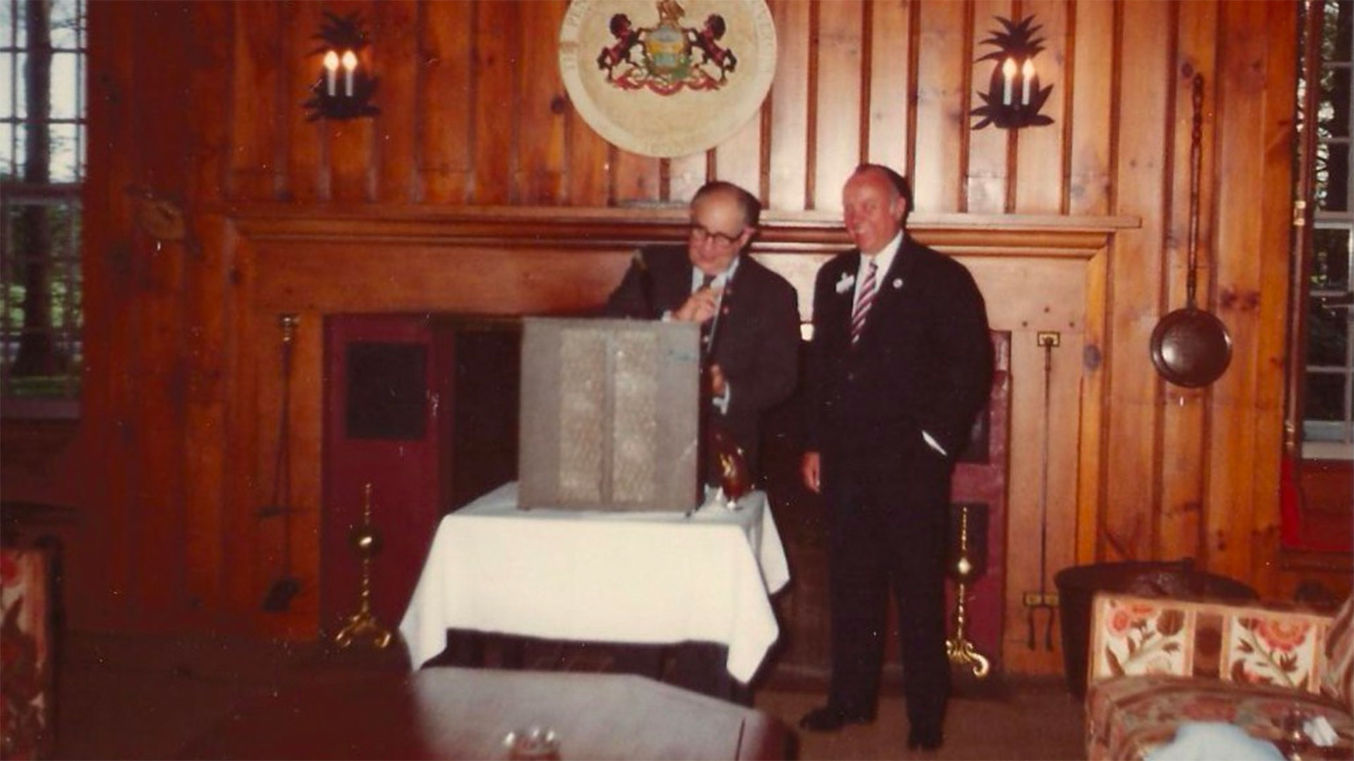 William Schreyer near the podium for an event