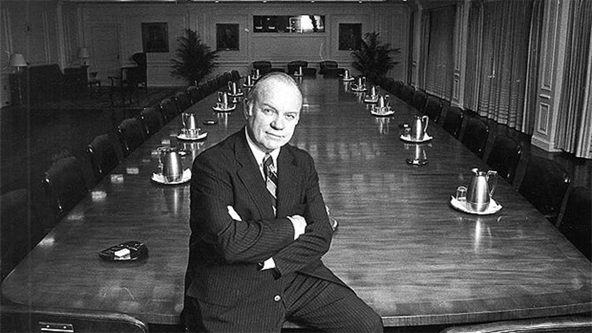 William Schreyer alone in a board room