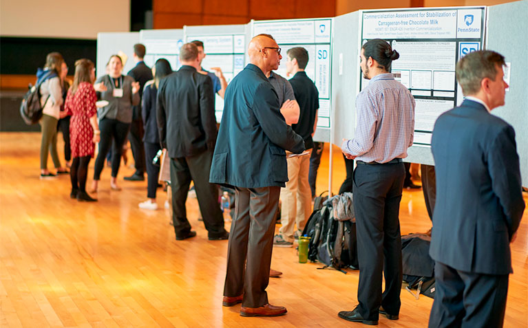 Students presenting their research at the Undergraduate Research Exhibition