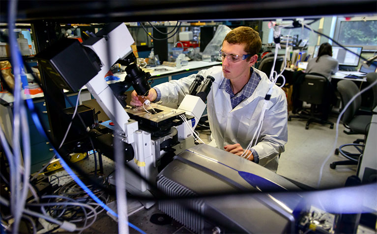 Schreyer Scholar Josh Riley performing research