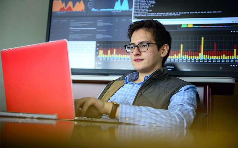 Schreyer Scholar Alejandro Cuevas working on his thesis