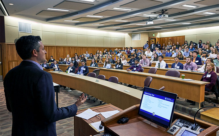 Scholar Alumnus speaking to current Scholars