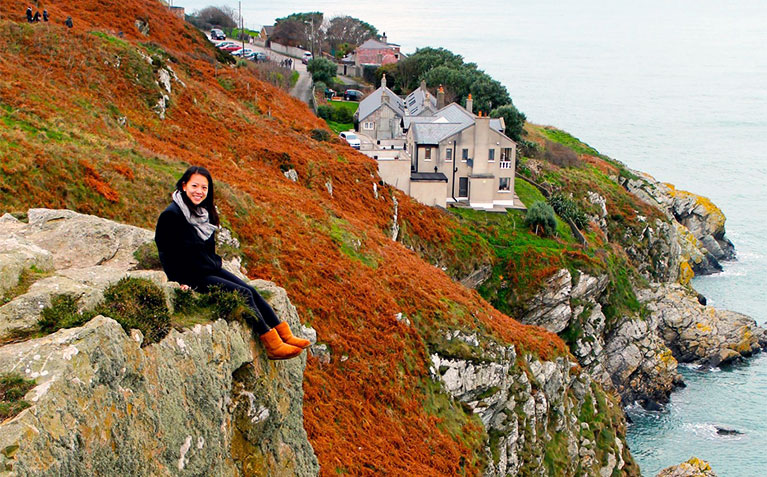 Female Schreyer Scholar sitting on a colorful hill in Ireland