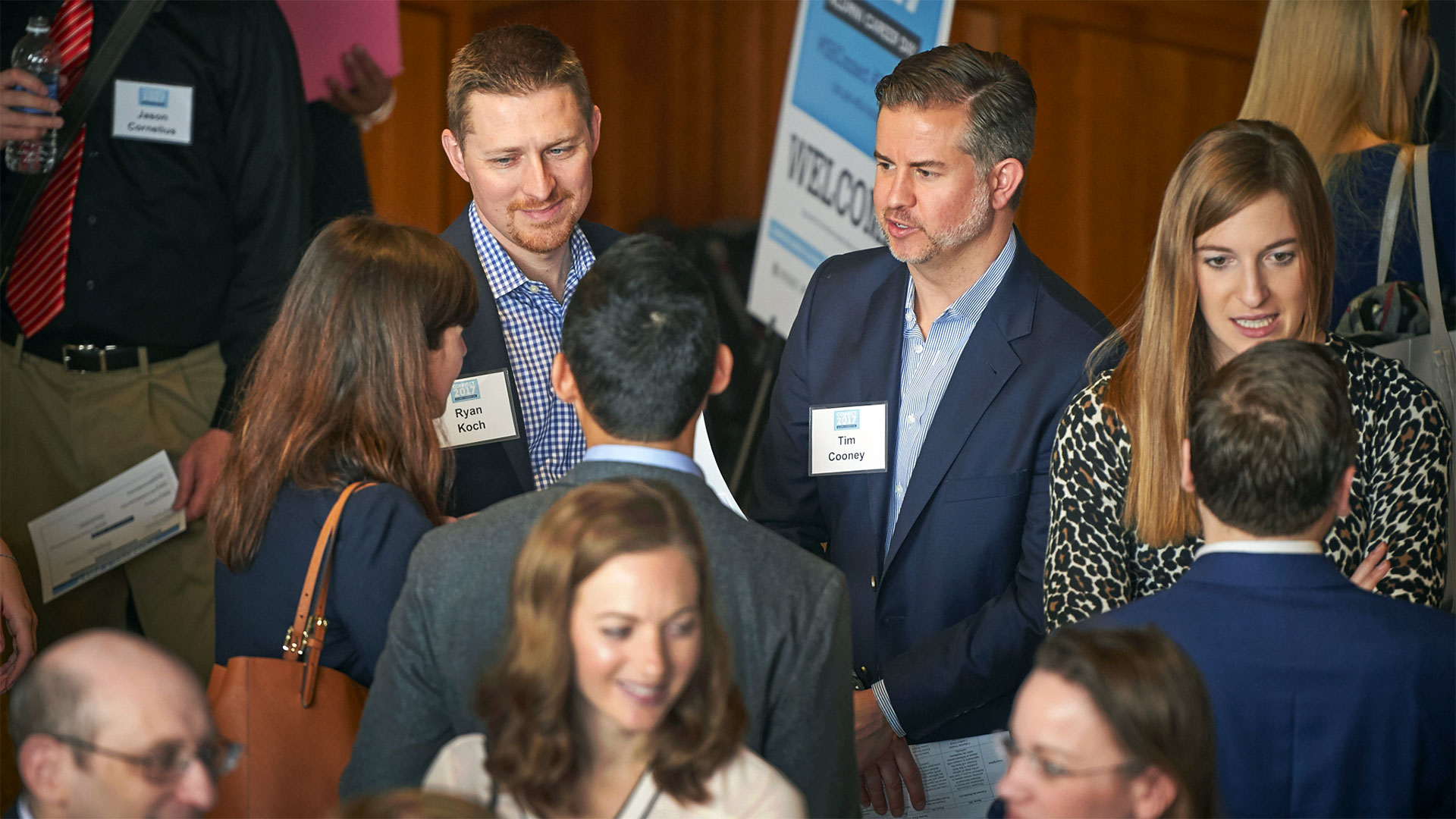 Scholar Alumni talking with current Scholars during Connect Networking and Career Day