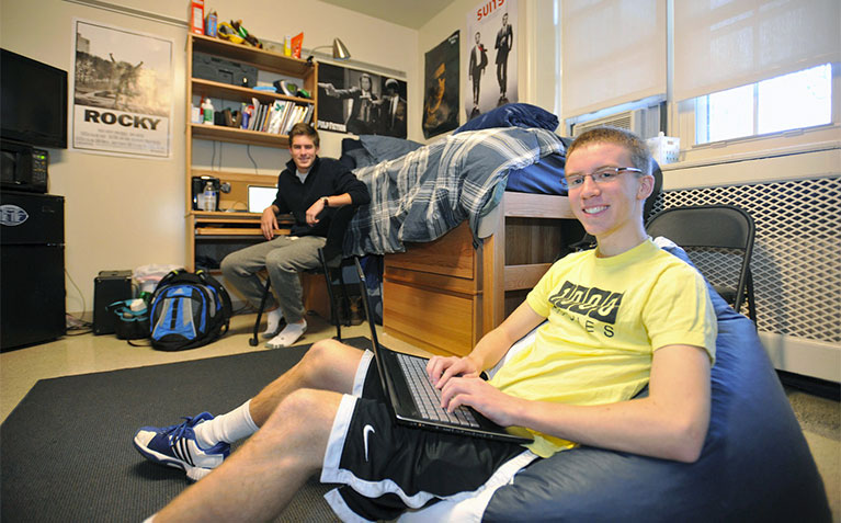 Scholars relaxing in their room in Atherton Hall