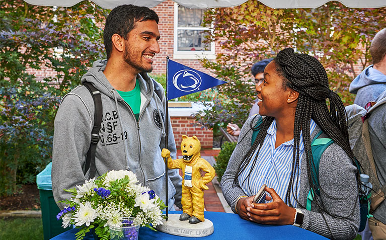 Two Scholars talking during Founders Day