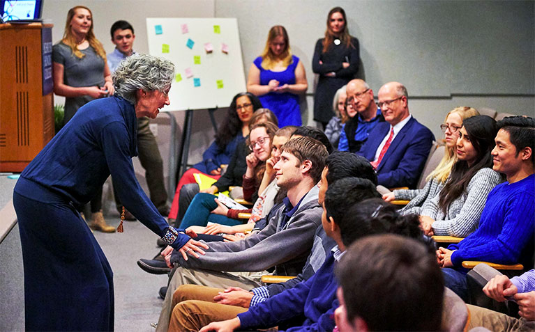 Dr. Susan Russell interacts with the crowd at the Luchinsky Lecture